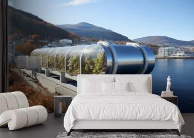 Green hydrogen pipeline with wind turbines in background - sustainable energy concept Wall mural