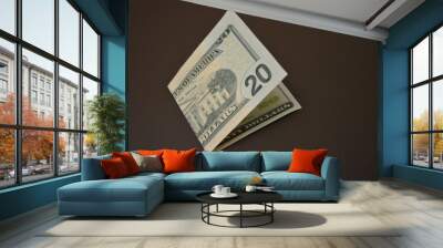 American cash, currency, twenty dollars located on a matte brown background. Financial market, profit from work and business. Wall mural