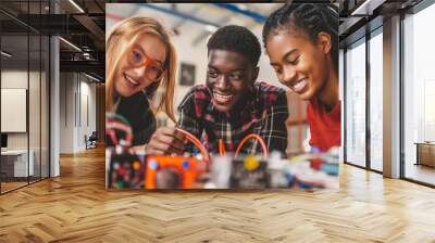 A group of diverse high school students working on a robotics project in their STEM class, teamwork and enthusiasm for technology and innovation. modern education and youth engagement in science Wall mural