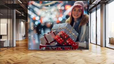 Happy woman shops for christmas gifts in a beautifully decorated mall, surrounded by twinkling lights and festive decorations. Happy New Year and Merry Christmas shopping centre Wall mural