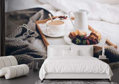 Traditional romantic breakfast in bed in white and beige bedroom Wall mural