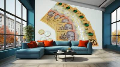 Australian dollars 50 banknotes and 2 dollars coins. Finance concept Wall mural