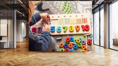 baby toddler early development. wooden stack and count rainbow colors learning game. child learn col Wall mural