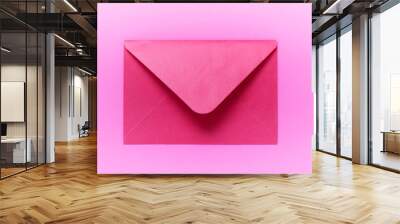 Closed pink envelope on pink background. Wall mural