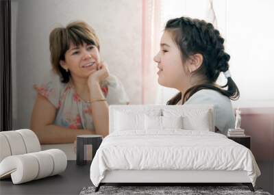 daughter talking with mom at home Wall mural