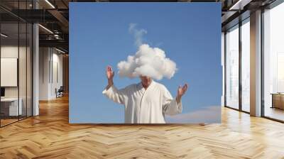 Man with cloud on his head over blue sky background. Freedom concept Wall mural