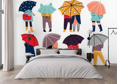 Autumn rainy weather. Hand drawn various stylish people standing under umbrellas in different clothes. Colored vector trendy illustration. Flat design. All elements are isolated Wall mural