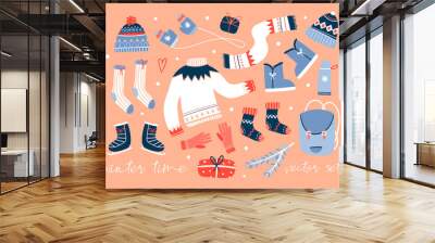 cozy winter clothes and other stuff. colored vector set. peach background. all elements are isolated Wall mural