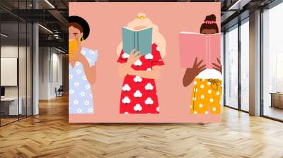 Set of three Girls that are reading Books while standing. Young women. Beautiful dresses with prints. Read more books concept. Hand drawn Vector trendy illustration. Pastel colors Wall mural