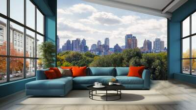 View of the Manhattan West Side with Central Park treetops in the front. Wall mural