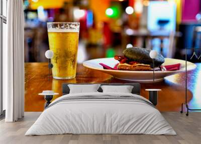 Black bread hamburger with iced beer on a wood table Wall mural