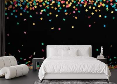 A vibrant display of colorful confetti against a black background, suggesting celebration. Wall mural