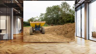 Image of front dumper truck in construction site. Copy space. Wall mural