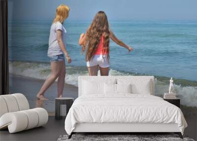 Two girls on the beach Wall mural