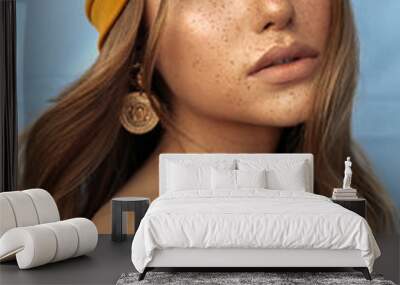 portrait of beautiful young woman with brown hair and freckles face Wall mural