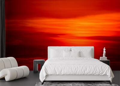 sunset and colorful flame cloud silhouette tree on red sky Wall mural