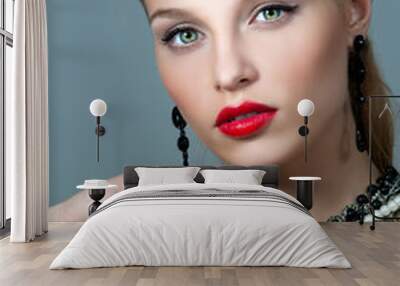 Beautiful woman with evening make-up. Jewelry and Beauty. Fashio Wall mural