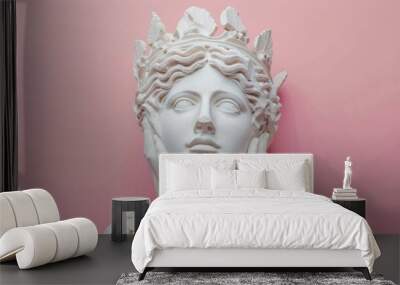 Creative collage featuring Apollo statue and pink background. Wall mural