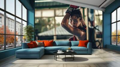 Female boxer  Rehearsing in the camp in thailand. Wall mural