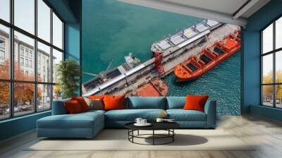 Aerial top view large general cargo ship bulk carrier. Wall mural