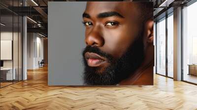 Profile portrait of young hadsome bearded African American man on grey background with copy space Wall mural