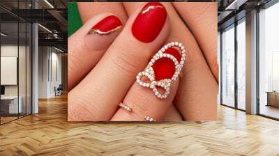 Womans hand with fashionable red manicure close up. Manicure, pedicure beauty salon concept. Wall mural