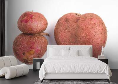 two ugly organic potatoes on white background Wall mural