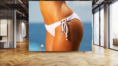 bikini in action Wall mural