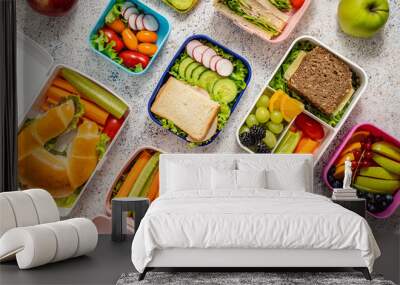 Shot of school lunchboxes with various healthy nutritious meals on stone background Wall mural