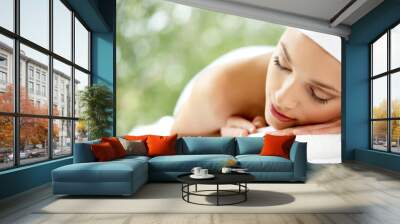 young beautiful and relaxed lady taking spa treatment Wall mural