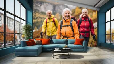 A group of elderly people walk along a tourist path in the mountains. Active lifestyle for old people in retirement. Generative ai. Wall mural