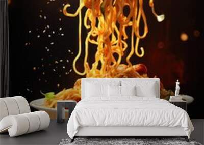 Instant noodle with sauce and vegetables flying in the air on dark Wall mural