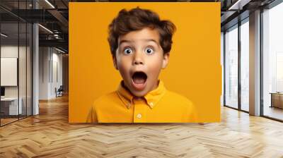 surprised curly-haired girl on solid bright background Wall mural