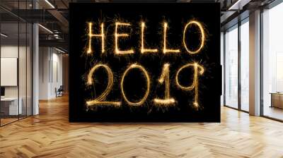 Happy new year 2018 text written with Sparkle fireworks isolated on black background Wall mural