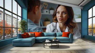 photo of a woman psychologist conducts an appointment with a child Wall mural