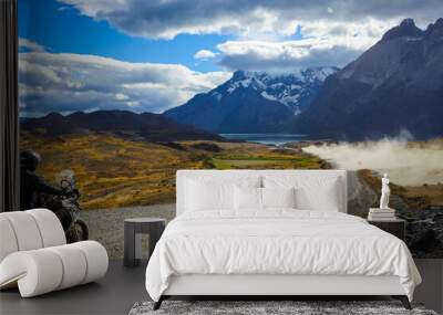 Biker on the Long Beautiful Road to the Mountains in the Torres Del Paine National Park, Chile  Wall mural