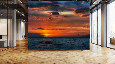 Scenic view of the cloudy sky and sunset over the pacific ocean on Maui beach, Hawaii Wall mural