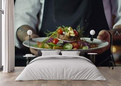 A Close-up of the Waiter's Hand Delivering a Plate of Food in a Restaurant Setting Wall mural