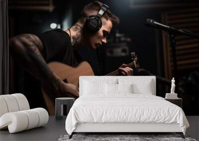 a fictional person, young man playing a guitar in a recording studio Wall mural