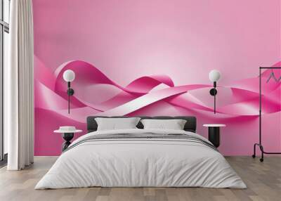 a ribbon with pink ribbon on a pink background Wall mural