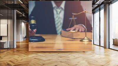 Attorney, Court judge,Legal and law concept image, A Male judge with client discussing about contract at courtroom on table.blurred lawyer working with laptop on background Wall mural