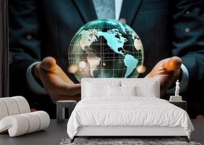 Businessman holding virtual planet Earth in his hands  Wall mural