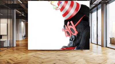 silly gorilla with cone hat and new year 2016 glasses blowing a party horn for chinese year of the m Wall mural