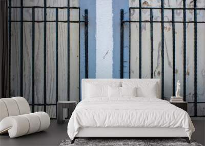 Close up of two Windows with black iron bars Wall mural