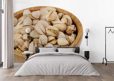 Background of delicious pistachios isolated on white background Wall mural