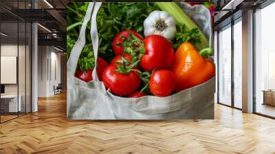 Fresh vegetables in a reusable bag on a kitchen countertop Wall mural