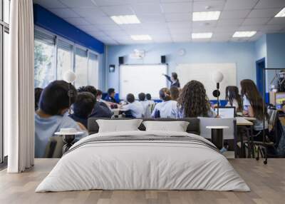 girl studies in class with her tablet Wall mural