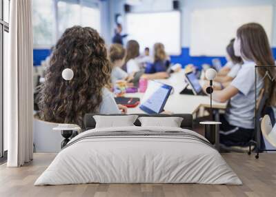 girl studies in class with her tablet Wall mural