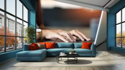 Hands of financial manager working on laptop data at home. Wall mural