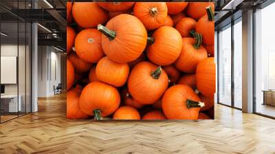 Recently harvested orange pumpkins in a random pile Wall mural